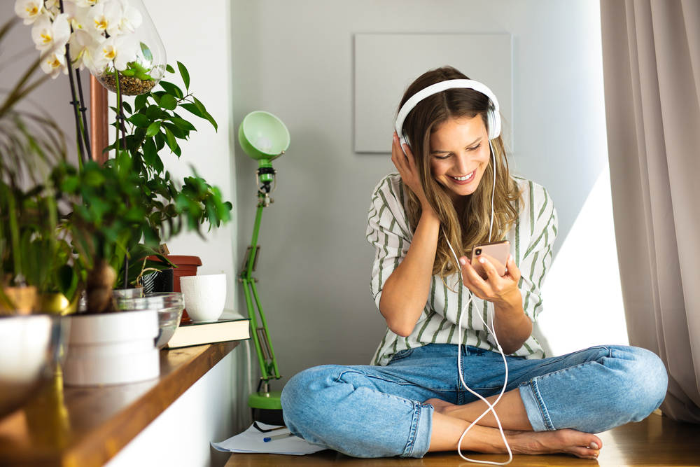 Lady in apartment with plants