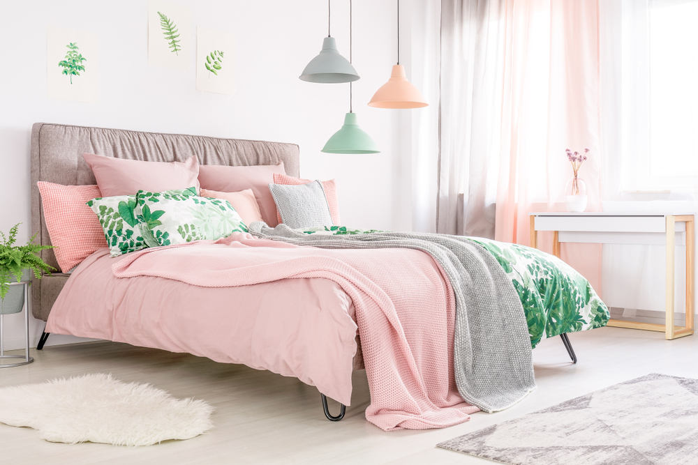 Pastel colored apartment bedroom
