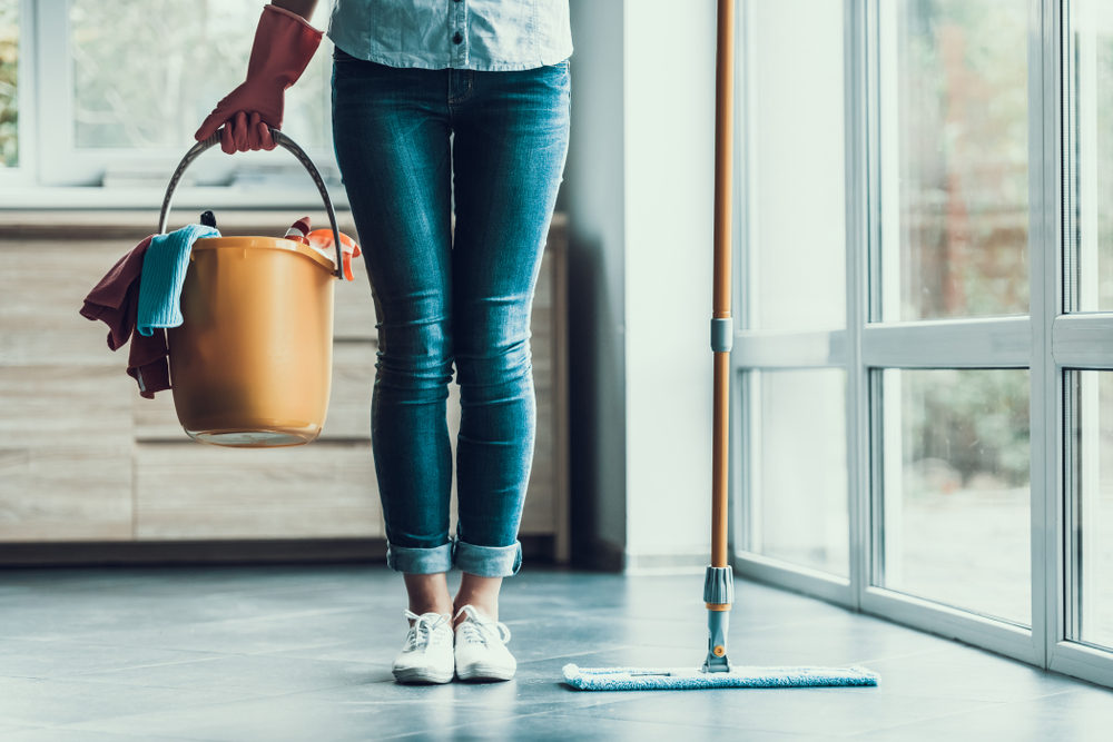 Woman cleaning her apartment